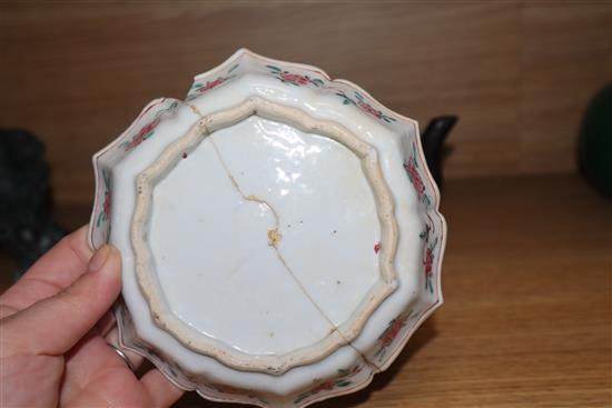 An 18th century Chinese Export famille rose teapot, cover and a similar dish